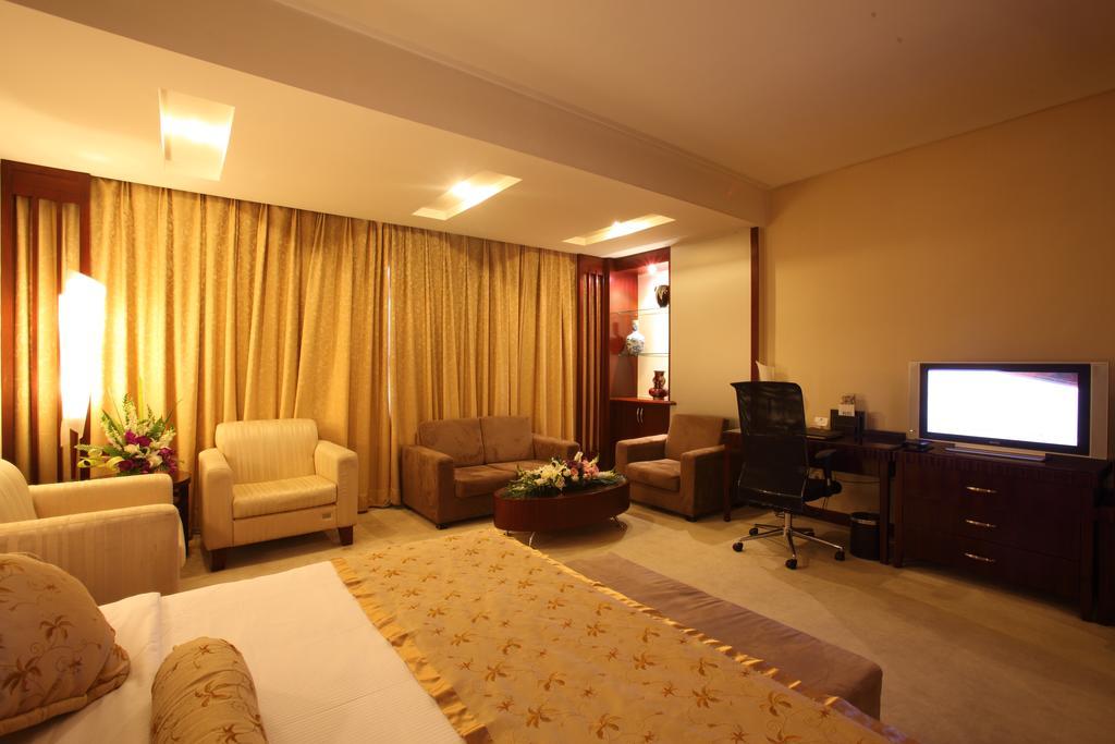 Beijing Wuhuan Hotel Pequim Quarto foto