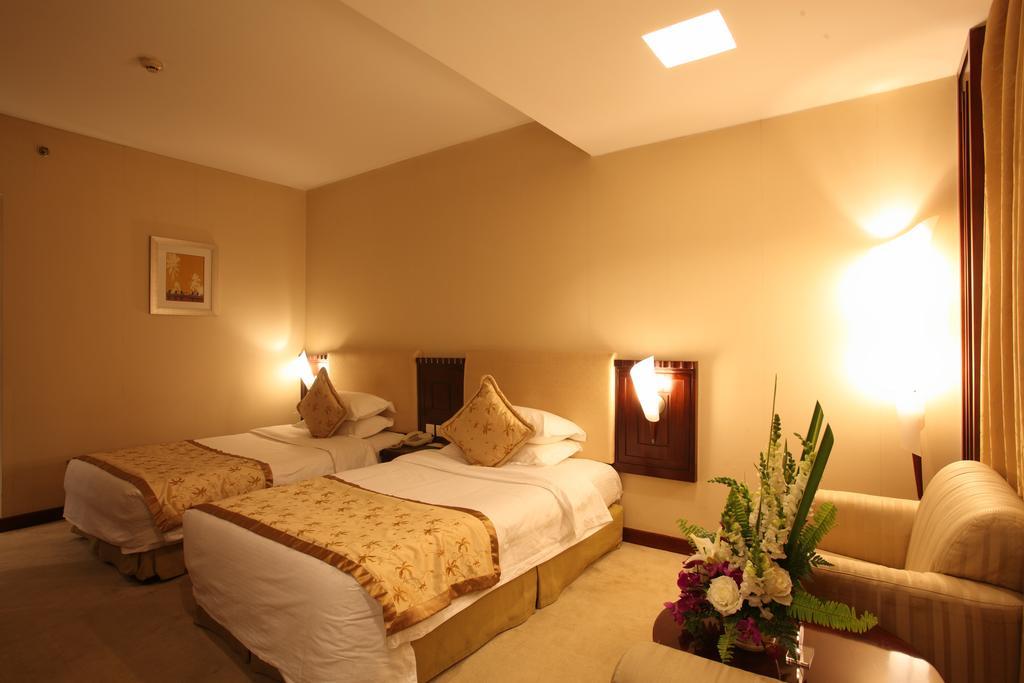 Beijing Wuhuan Hotel Pequim Quarto foto