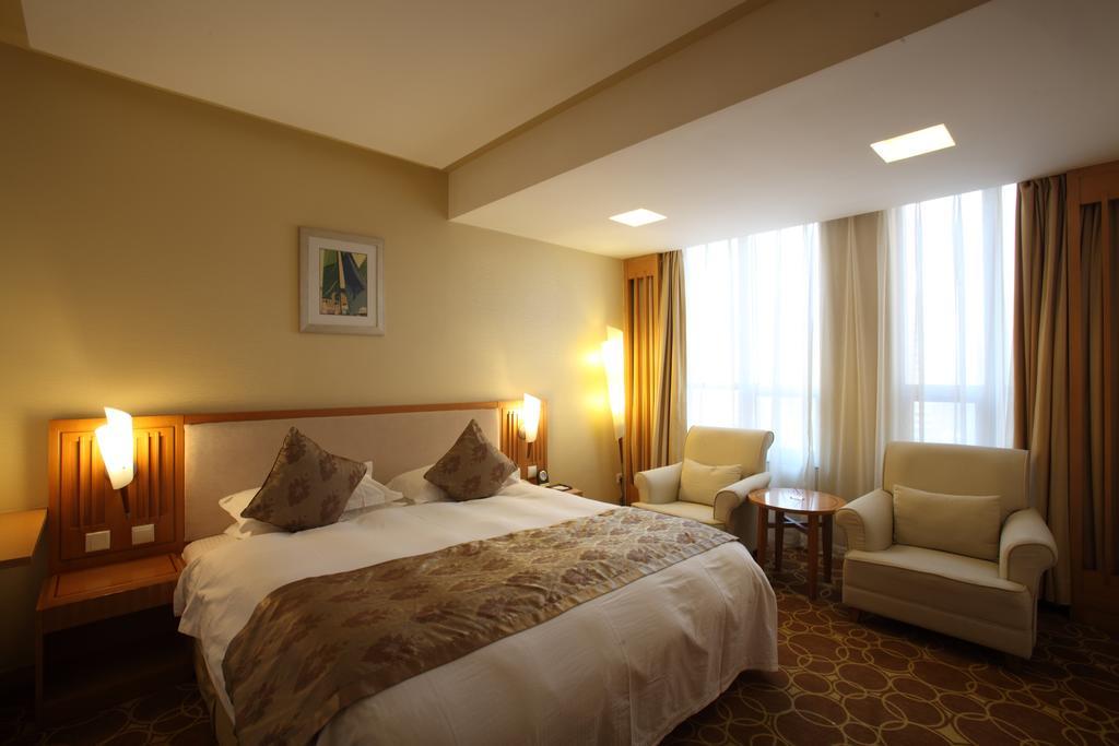 Beijing Wuhuan Hotel Pequim Quarto foto