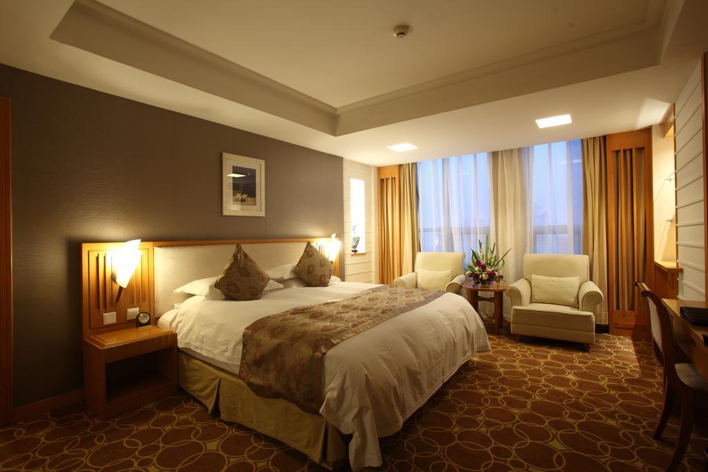 Beijing Wuhuan Hotel Pequim Quarto foto