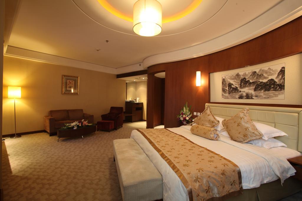 Beijing Wuhuan Hotel Pequim Quarto foto