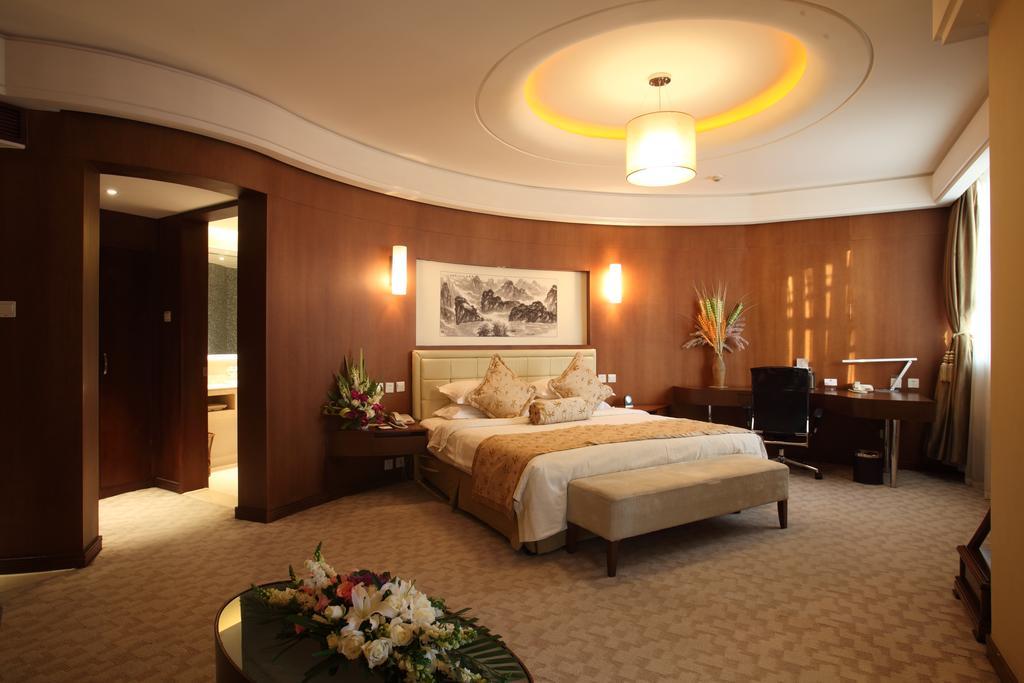 Beijing Wuhuan Hotel Pequim Quarto foto