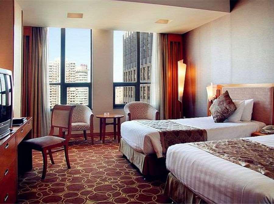 Beijing Wuhuan Hotel Pequim Quarto foto