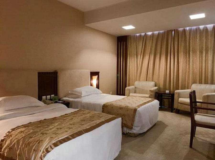 Beijing Wuhuan Hotel Pequim Quarto foto